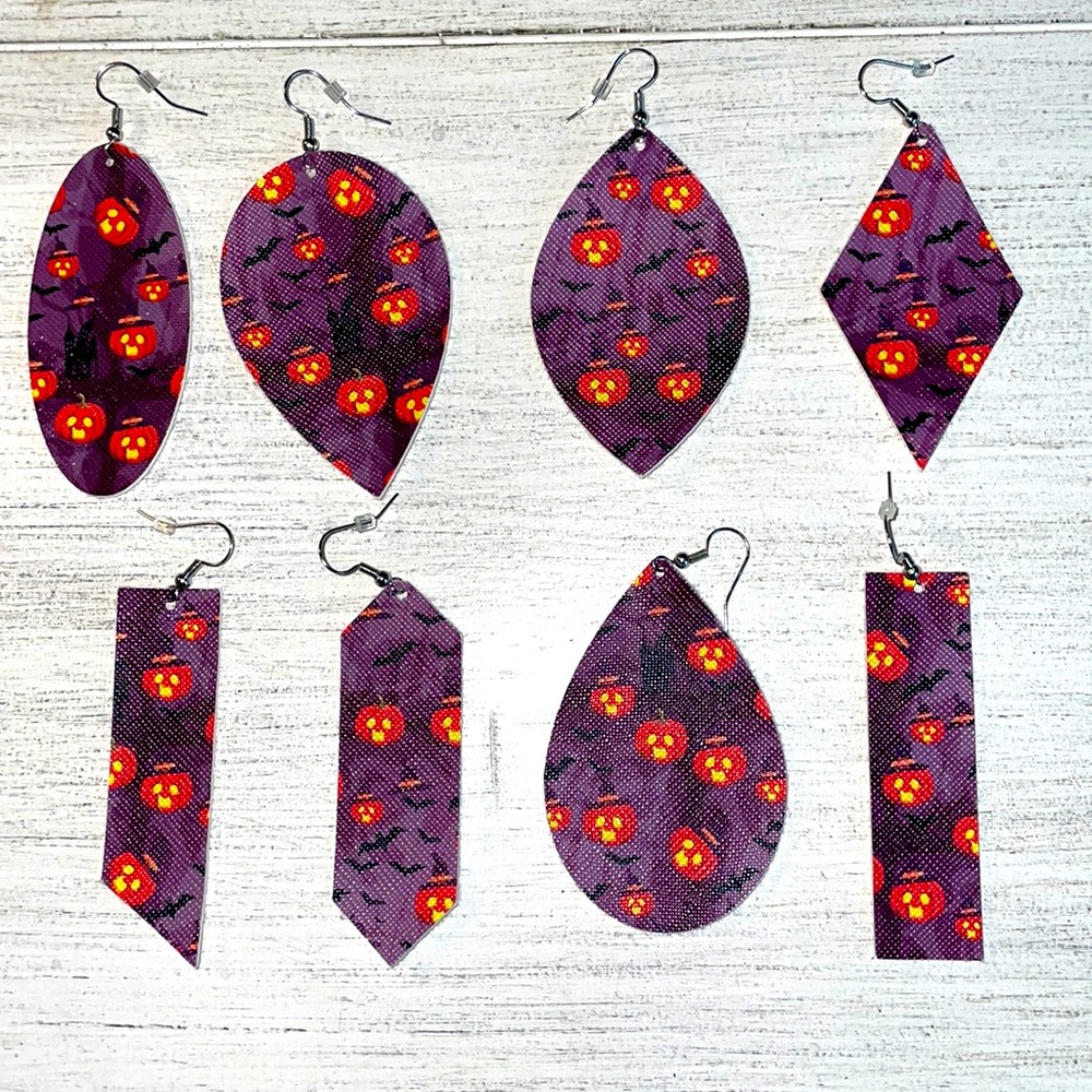 Purple with orange jack o lantern faux leather earrings